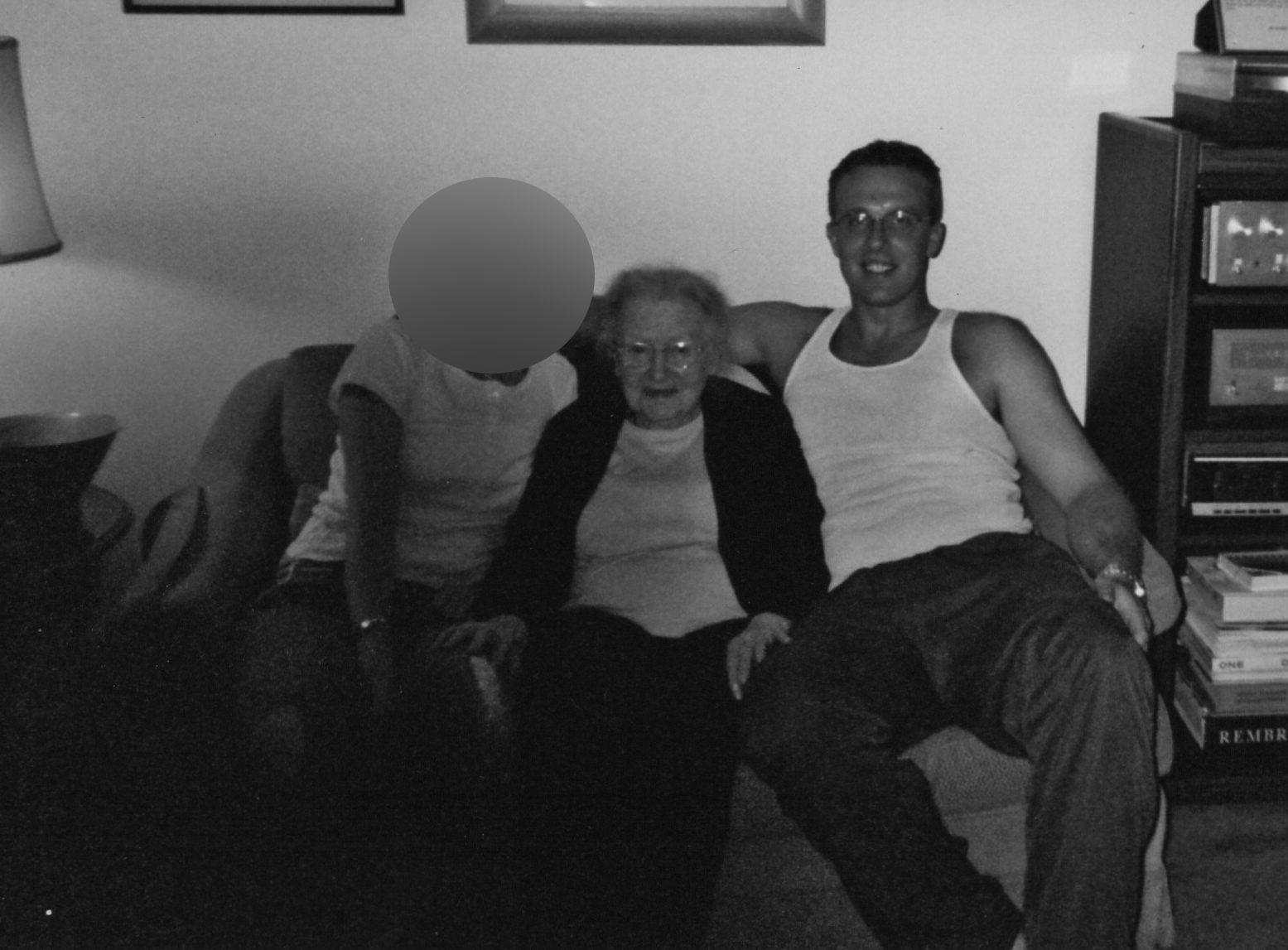 Michael with his grandmother during early recovery (another face blurred for privacy)